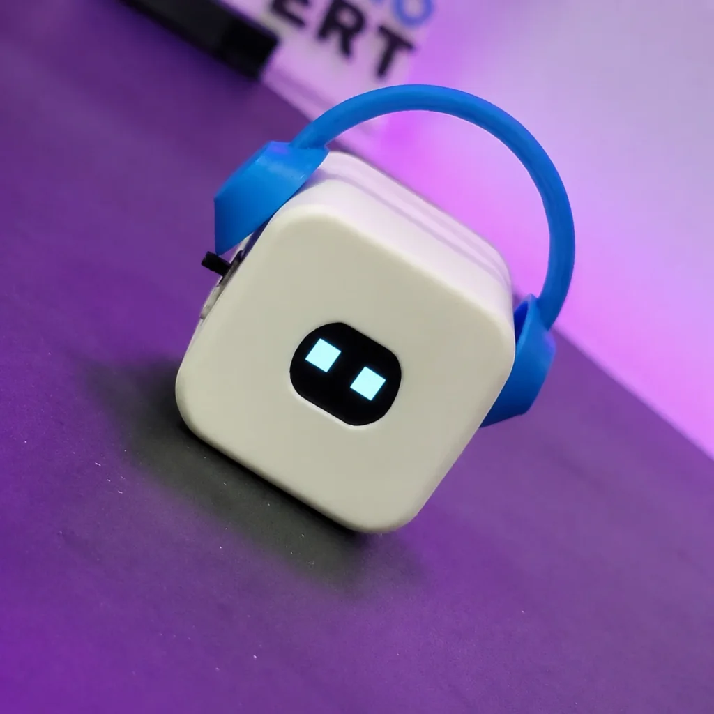BeatBot mini desk buddy side view with outer headphone band