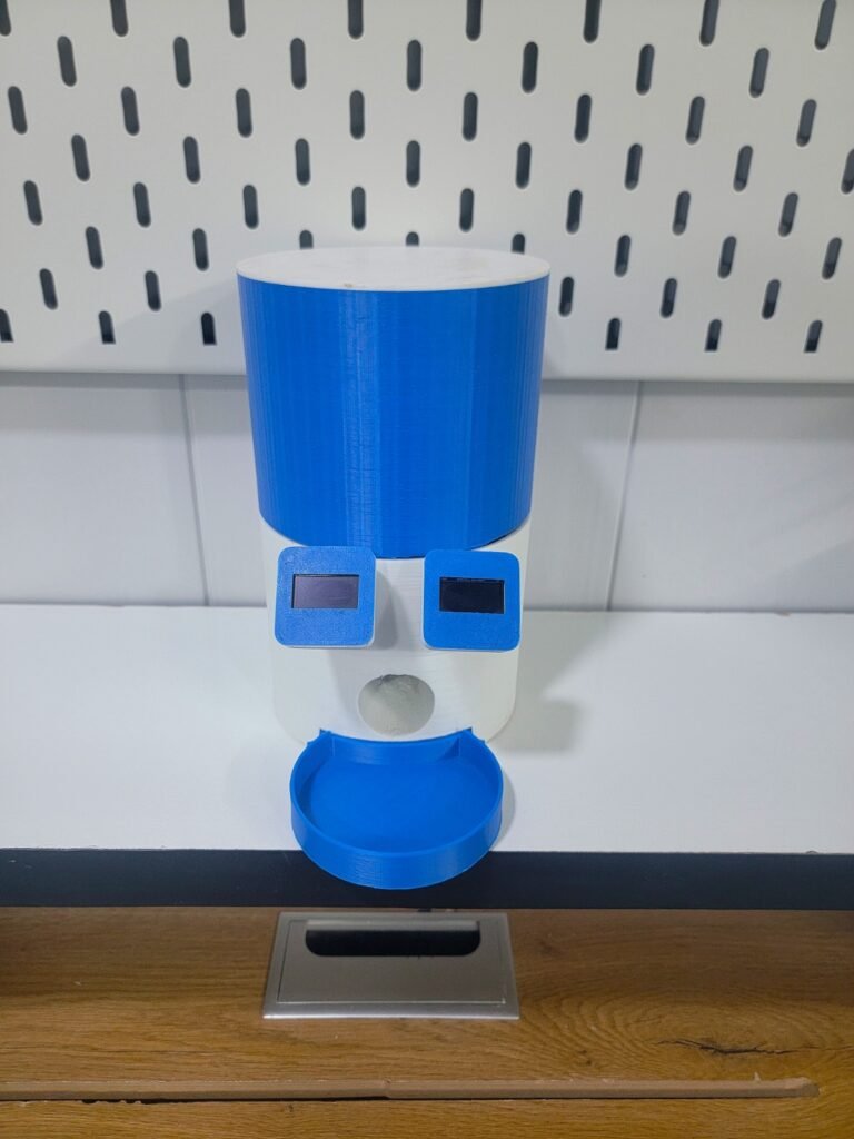 Custom blue and white 3D-printed enclosure for ESP32 WiFi automatic pet feeder with dual OLED screens